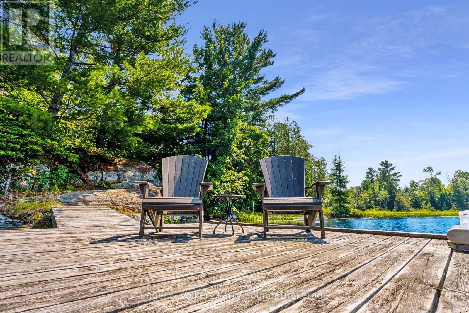 Private waterfront on clear Limestone Lake