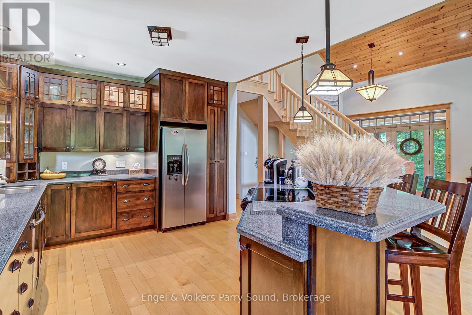 Warm wood kitchen with generous island